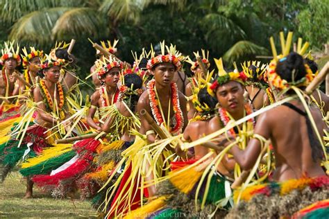 Yapese Girls In Traditional Clothing Dancing With Bamboo Pole At Yap