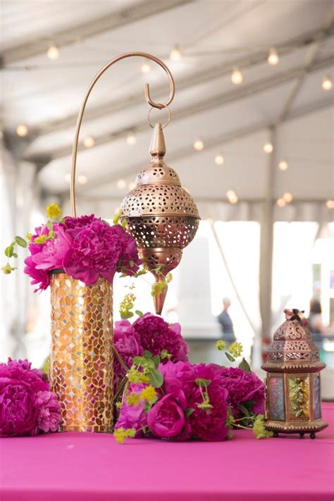 these gold moroccan lantern centerpieces go gorgeously with a colorful wedding gold lanterns