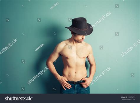 Sexy Shirtless Cowboy Posing By Blue Stock Photo 191673779 Shutterstock