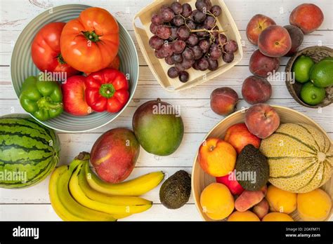 Image Of Fruits And Vegetables In Fruit Bowls Or On The Table Ripe
