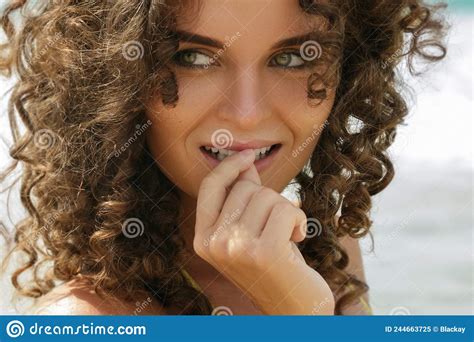 Portrait Of Beautiful Young Woman With Curly Hair Stock Image Image