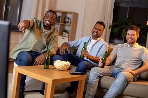 Happy Male Friends With Beer Watching Tv At Home Stock Photo Image Of