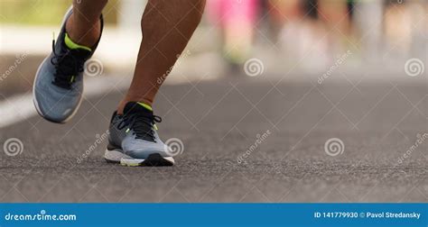 Runners Feet Running On Road Close Up On Shoe Stock Photo Image Of