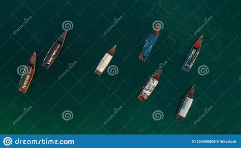 Top View Of Fishing Boats Traveling In The Same Direction Stock Photo