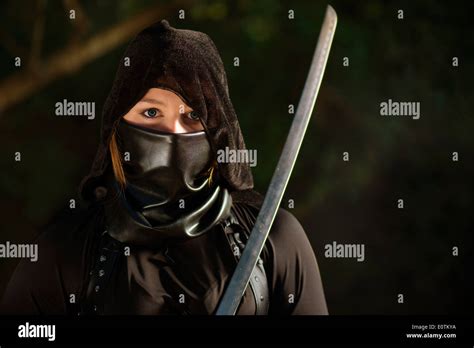 Portrait Of Young Female In Ninja Costume Stock Photo Alamy