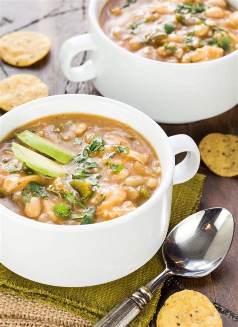 This simple and delicious white bean chicken chili, simplified for slow cooking, is practically screaming make me! for the upcoming fall and winter months. Slow Cooker White Chicken Chili - Garnish with Lemon