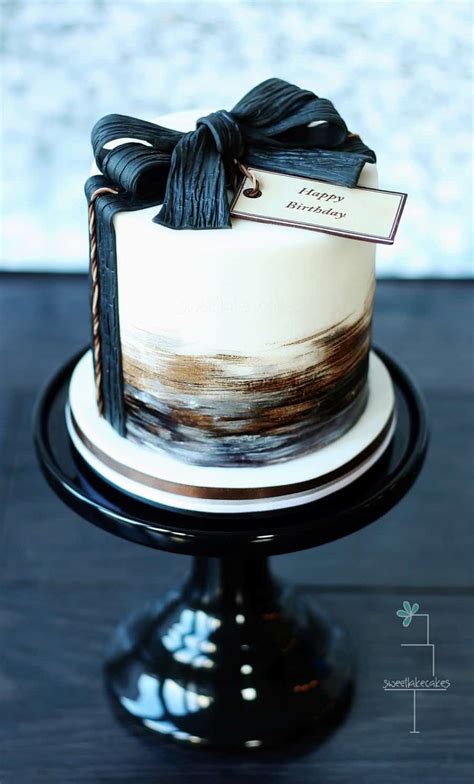 A two tier cake made for a young mans 'great gatsby' themed 30th birthday party! 8 Diy Masculine Birthday Cakes - diy Thought