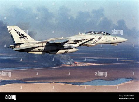 A Fighter Squadron 143 Vf 143 F 14b Tomcat Aircraft Flies Over The