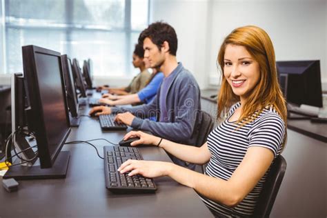 Happy Student In Computer Class Smiling At Camera Stock Photo Image