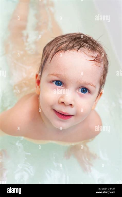 Adorable Baby Taking Bath And Swim On Chest Stock Photo Alamy