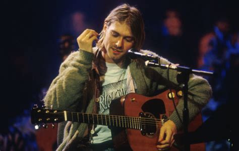 Kurt cobain performing in a dress. Owner of Kurt Cobain's 'MTV Unplugged' cardigan explains why he's selling it