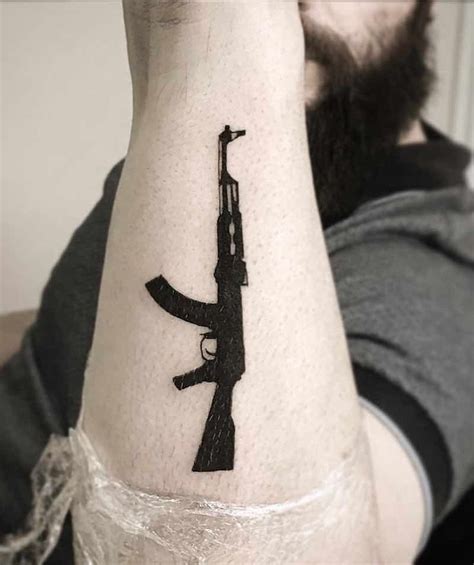 25 Der Besten Gun Tattoos Tattoo Insider Angela Becker Blog