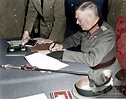 Field marshal Wilhelm Keitel signing the unconditional surrender of the ...