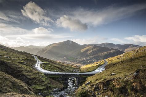 To go past something or someone or move in relation to it, him, or her: Healy Pass Bridge - Norman McCloskey PhotographyNorman ...
