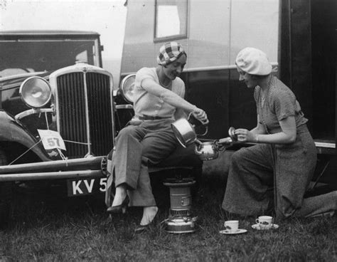 tea for two a couple of women make a cuppa by the side of their caravan in 1931 camping