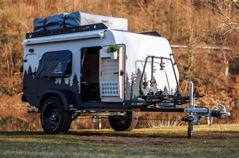 A Micro Camper With Glass Doors And A Skylight Other Camping Essentials