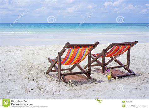 Two Beach Chairs On The White Sand Beach Before Blue Sea Stock Image