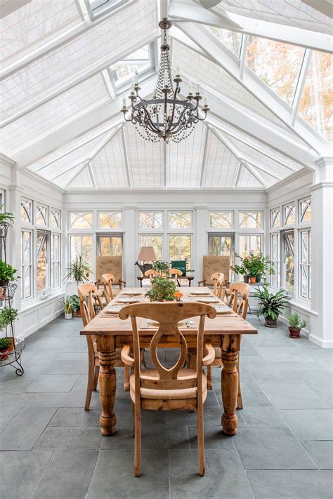 110822 White Dining Sunroom With Roof Window And Travertine Floors