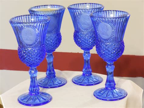Four Fostoria Avon Cobalt Blue Glass George Washington Commemorative Candle Holders