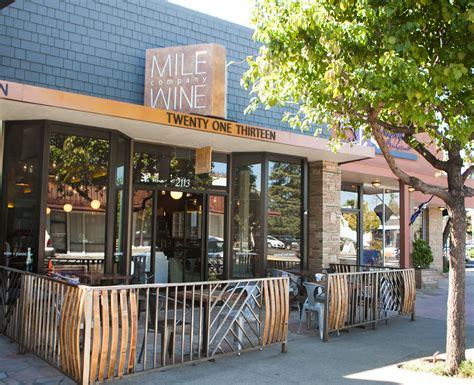 Google maps includes street view, a feature that shows images taken from a specially equipped car. Facade, sidewalk seating, wine barrel stave fence, signage ...