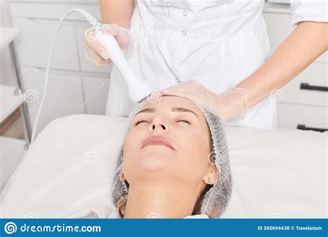 Beautician Makes Rf Lifting For Rejuvenation Woman Face Anti Aging