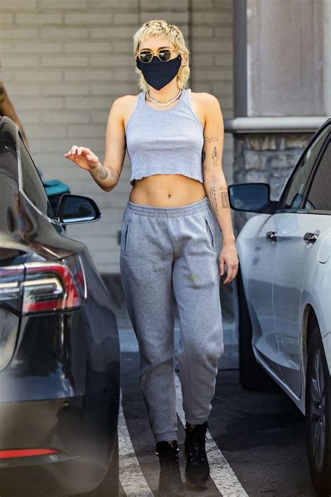 Miley Cyrus Shows Some Abs In A Crop Top While Picking Up Supplies From CVS Pharmacy In