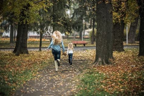 Mother With Daughter In Autumn Park Stock Image Everypixel