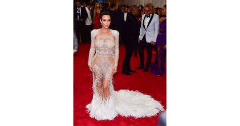 Kim Kardashian Adorned Her Curves With Feathers And Embellishments In