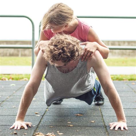Man And Woman Doing Push Ups Outdoor Stock Image Image Of Muscles