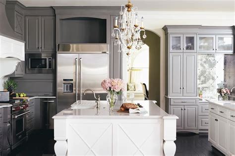 The kitchen pictured above combines classic all white cabinets with a warm gray kitchen island at the center. Dark Gray Kitchen Cabinets with White Island ...