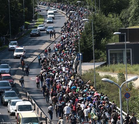 Thousands Of Refugees Begin 100 Mile Walk From Hungary To Austria