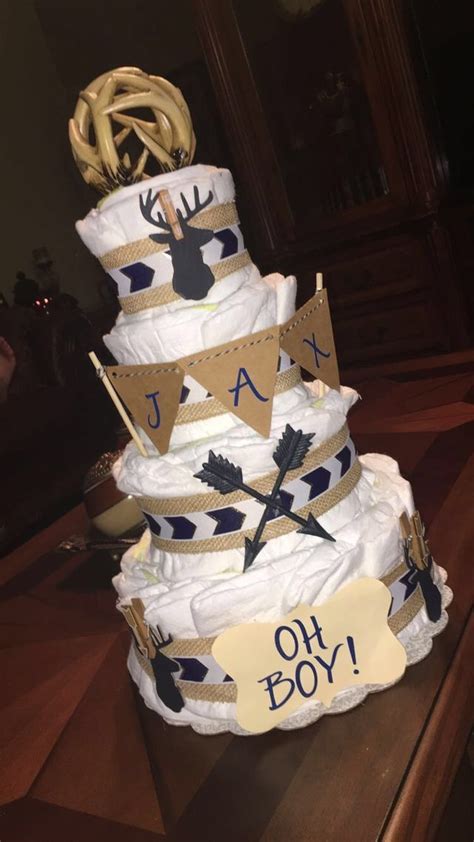 See more ideas about baby boy shower, diaper cake boy, baby shower gifts. Deer diaper cake | Hunting baby showers, Baby shower camo