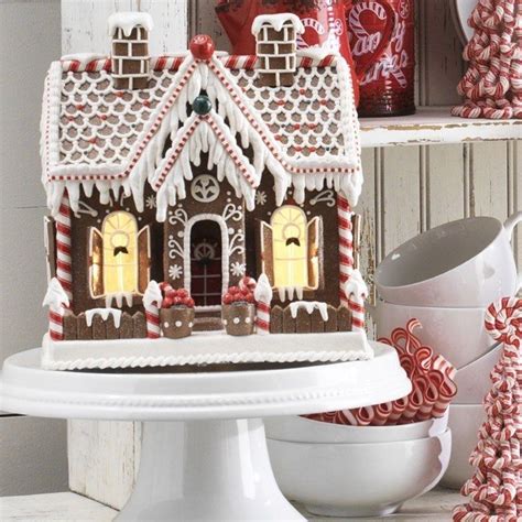 Gingerbread house to spread holiday charm this yuletide season. Raz 11" Lighted Gingerbread House Christmas Figure 3719150 ...