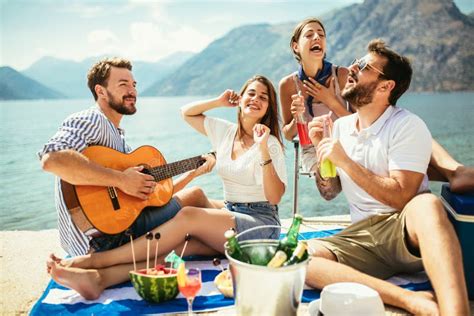 Young People Having Fun At Beach Party Stock Image Image Of Melon