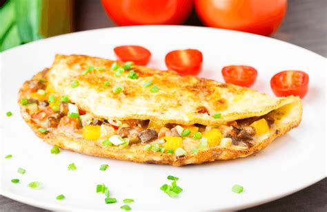 Includes recipes for both types of omelette as well as suggested fillings. Hearty Veggie Omelet Recipe | SparkRecipes