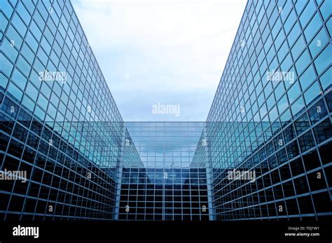 Modern Futuristic Business Building With Glass Facade Stock Photo Alamy