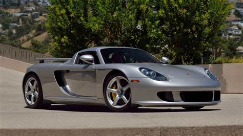 Nows Your Chance To Own A 25 Mile Porsche Carrera Gt The Drive