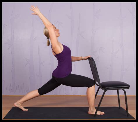 A Modified Version Of The Cresent Lunge Yoga Pose Using A Chair