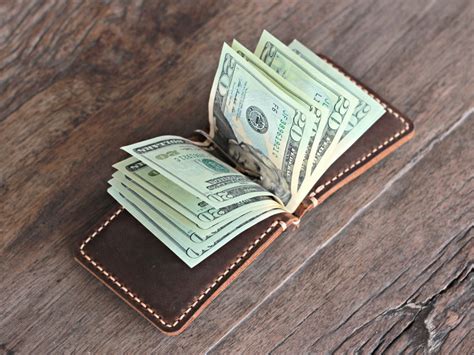 This leather money clip bifold wallet has cover on left side under which there is a metal flip for cash from all currencies bills. Money Clip Men's Travel Wallet - Gifts For Men