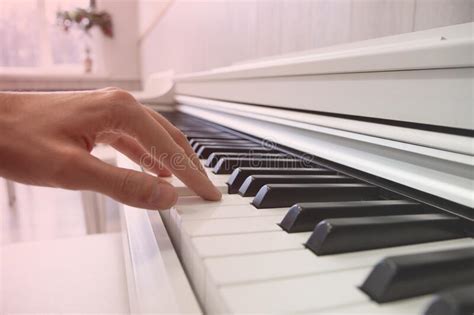 The Hands Of A Musician Playing The Piano Closeup Stock Photo Image