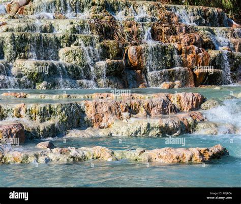 Natural spa with waterfalls and hot springs at Saturnia thermal baths