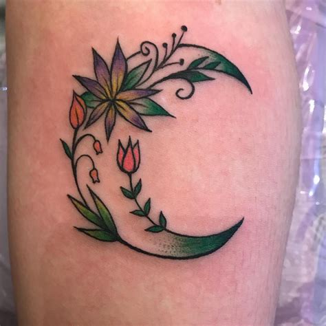 18 Flower Moon Tattoos Inspired By This Months Full Moon Feather