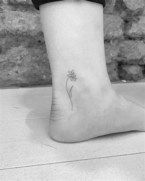 Minimalist Daffodil Tattoo On The Ankle