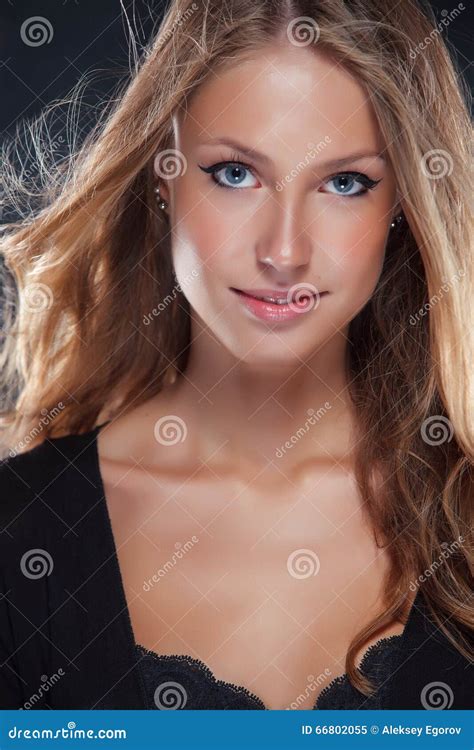 vivacious beautiful blonde woman in lingerie stock image image of macro blowing 66802055