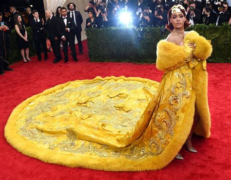 Rihanna Wears A Yellow Guo Pei Dress At The Met Gala Met Gala The Good The Bad And The Naked