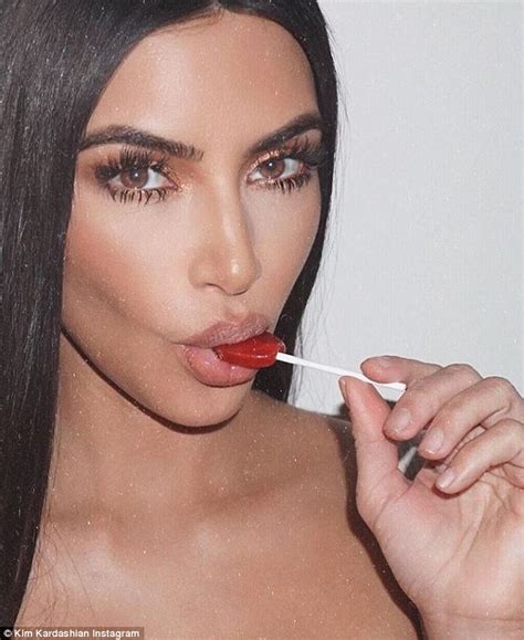 Kim Kardashian Photoshops Her Brand New Kimoji Perfumes Into Old
