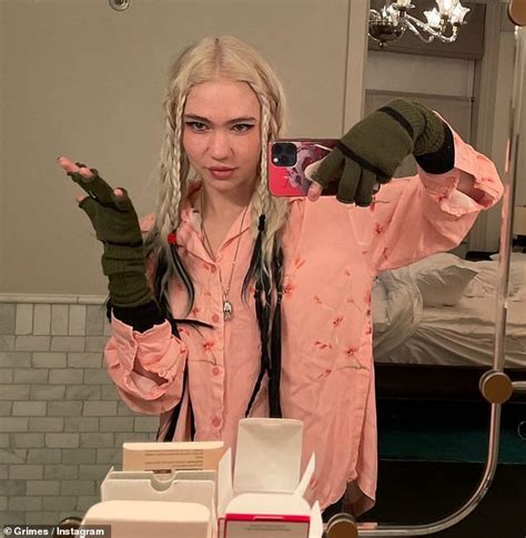 Grimes Shares A Snap Of Her Bandaged Face After Revealing She Wants To Get Elf Ear Surgery