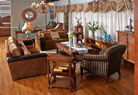 Desain ruang tamu minimalis modern dengan sofa putih dan meja coklat kayu, dinding warna putih dan jendela lebar serta tirai yang. Perabot Kayu Ruang Tamu | Desainrumahid.com