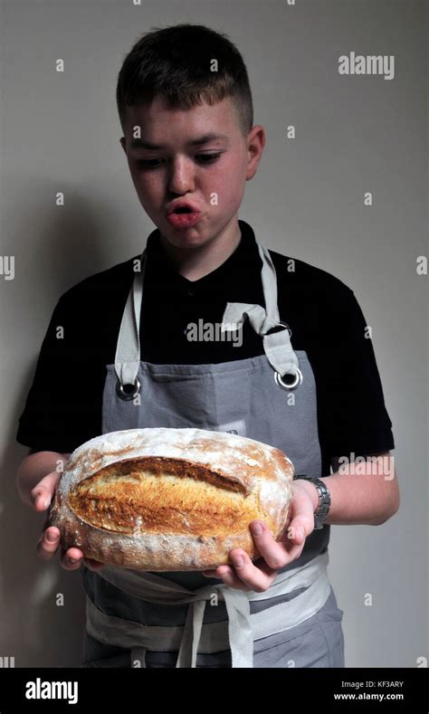 Boy With Homemade Bread Stock Photo Alamy