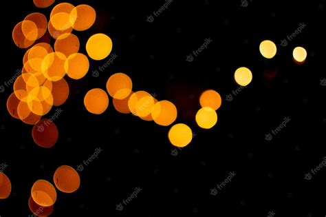 Premium Photo Bokeh Effect Golden Abstract Black Background